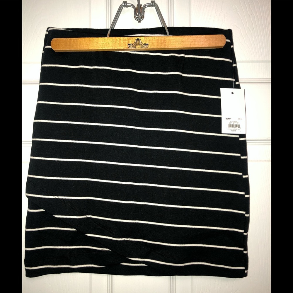 Black skirt with white stripes.